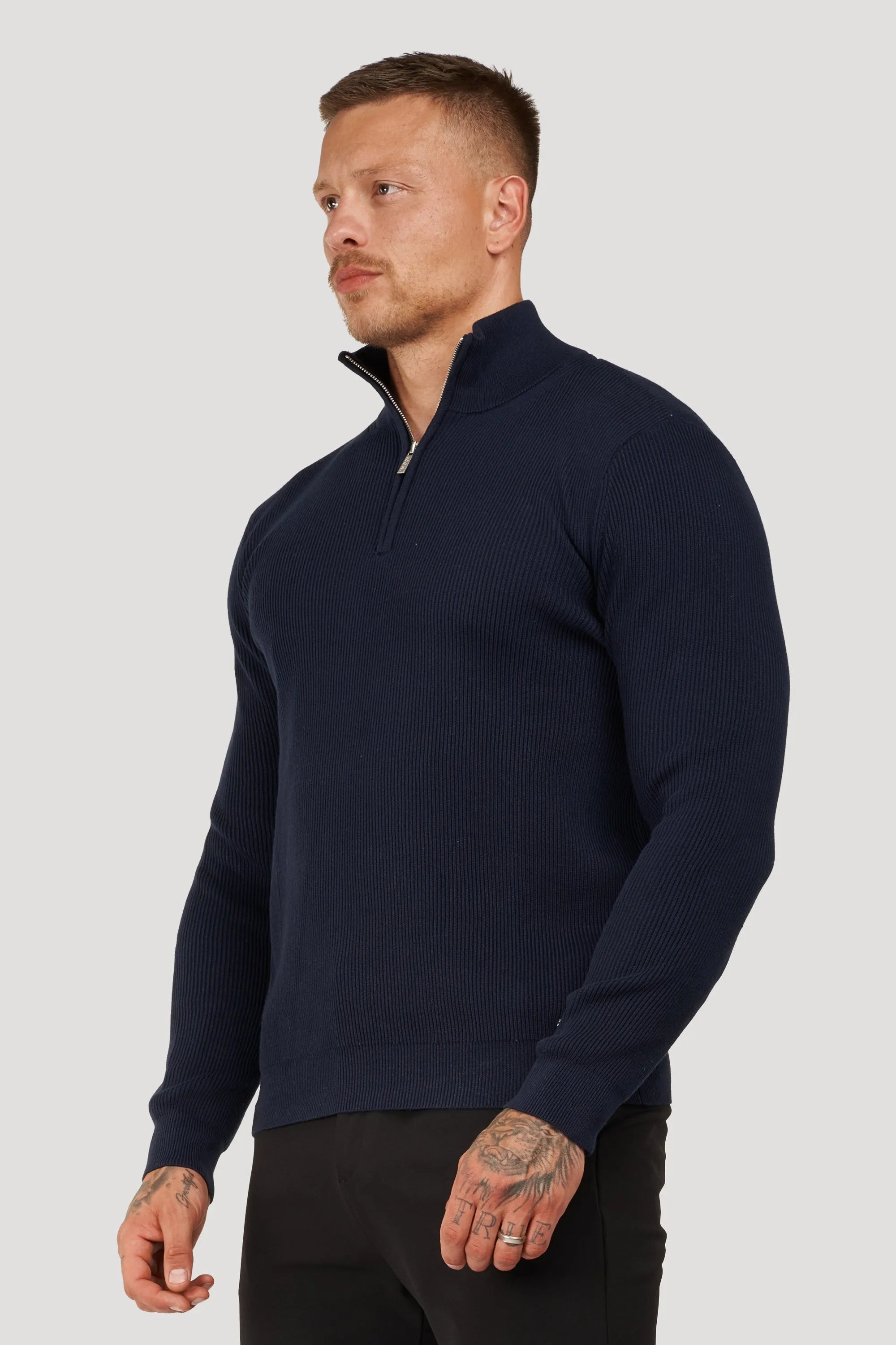 THE AUREN HALF ZIP SWEATER
