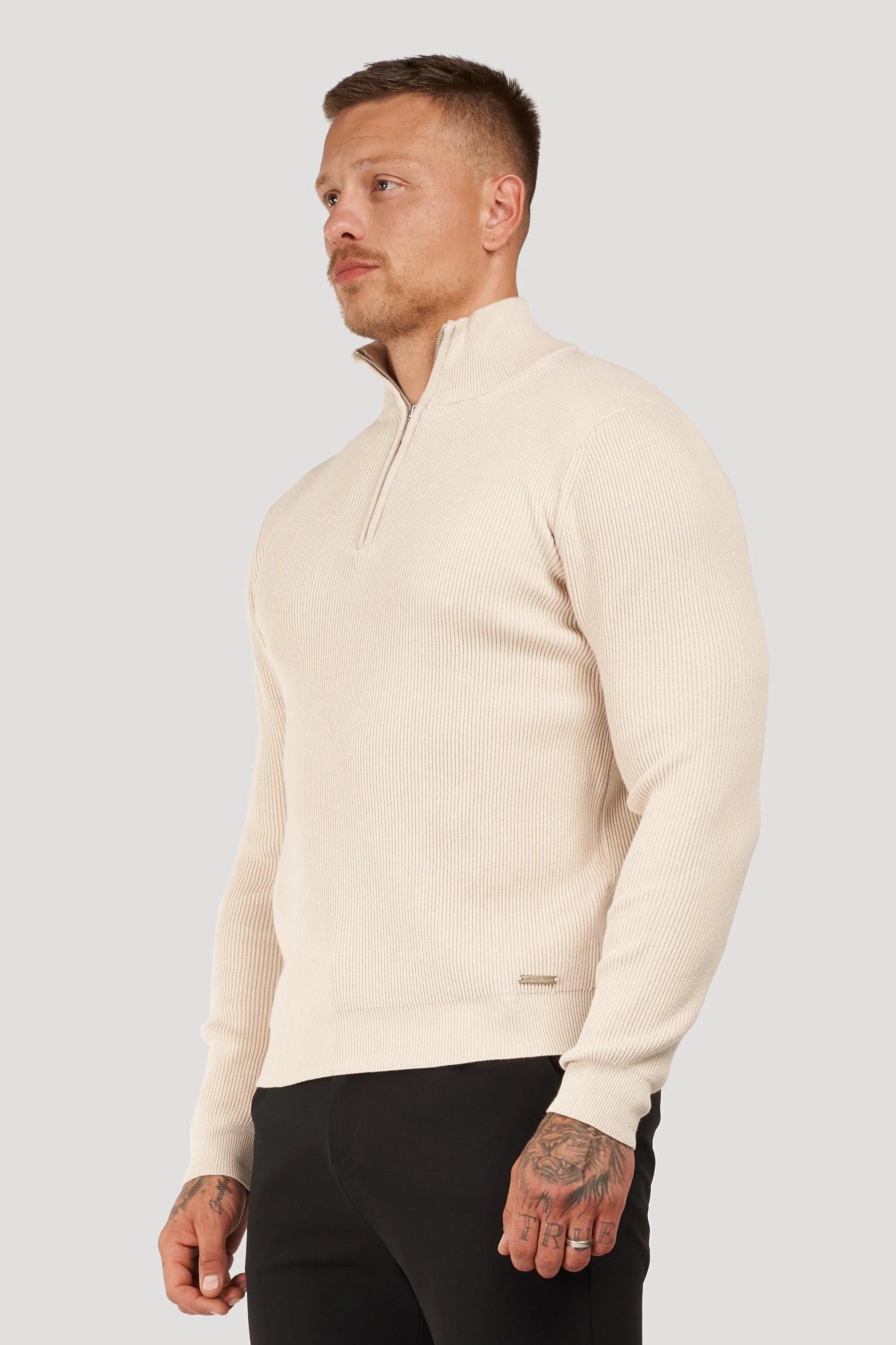 THE AUREN HALF ZIP SWEATER