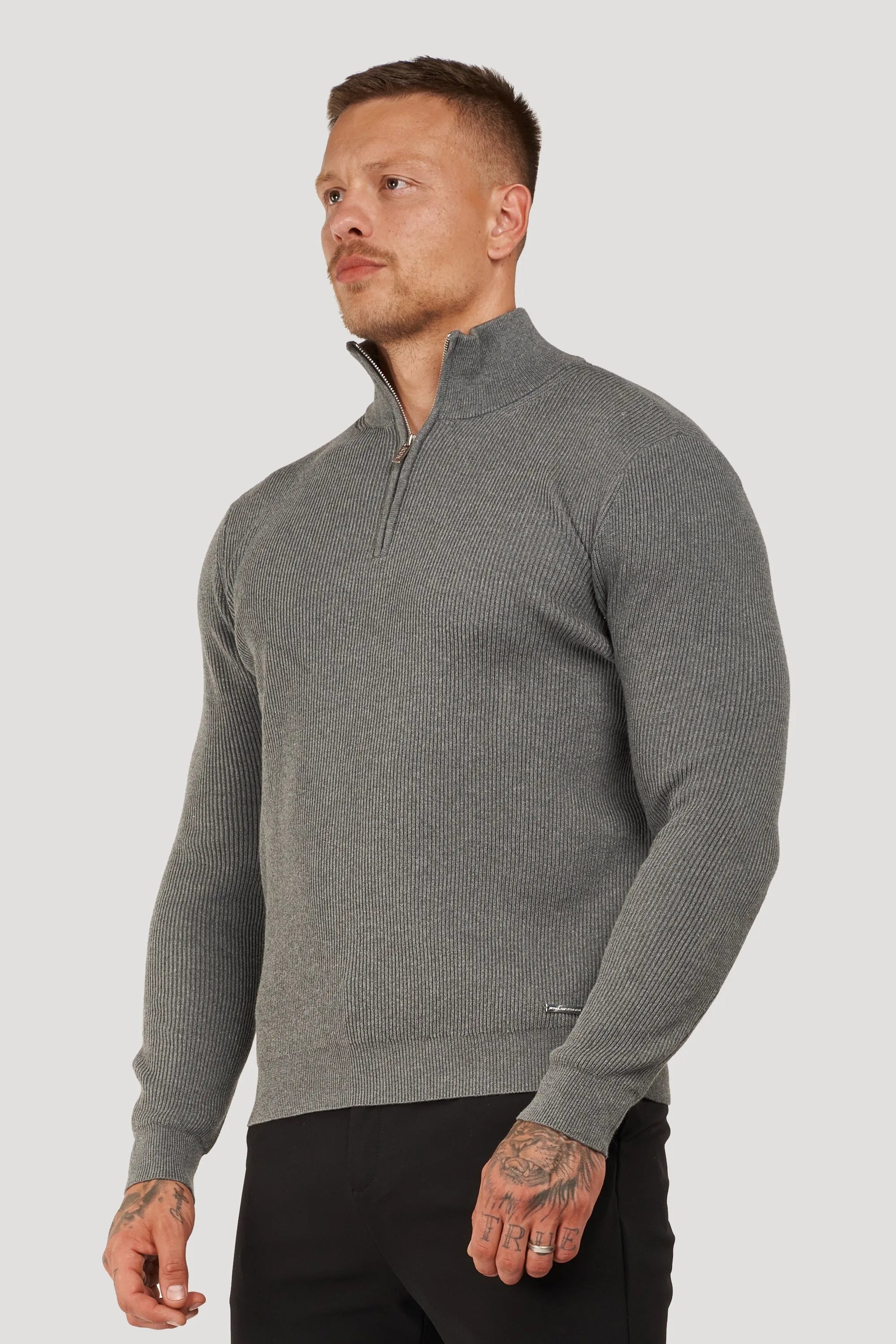 THE AUREN HALF ZIP SWEATER