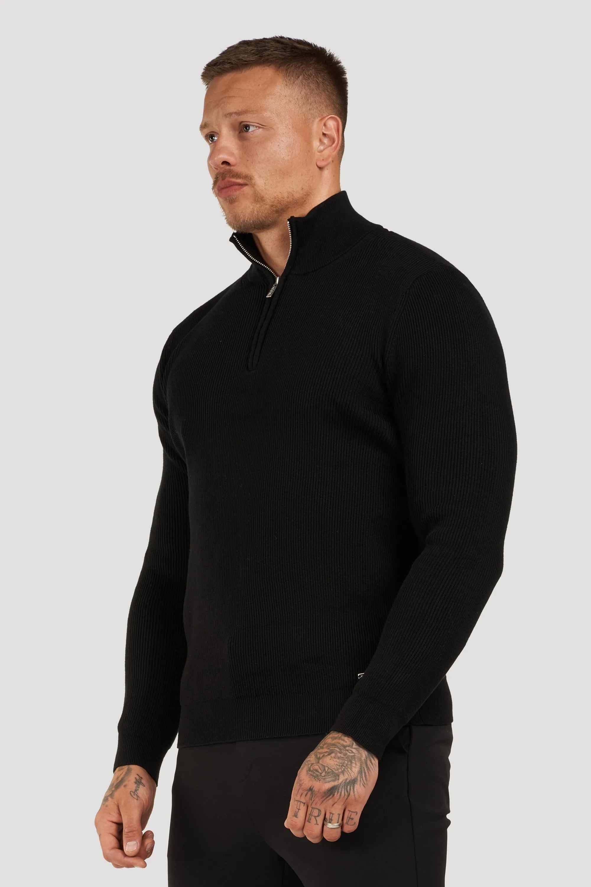 THE AUREN HALF ZIP SWEATER